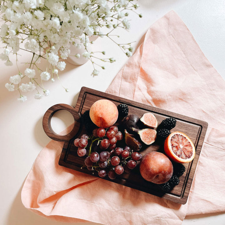 image of cheese board with fruit and figs